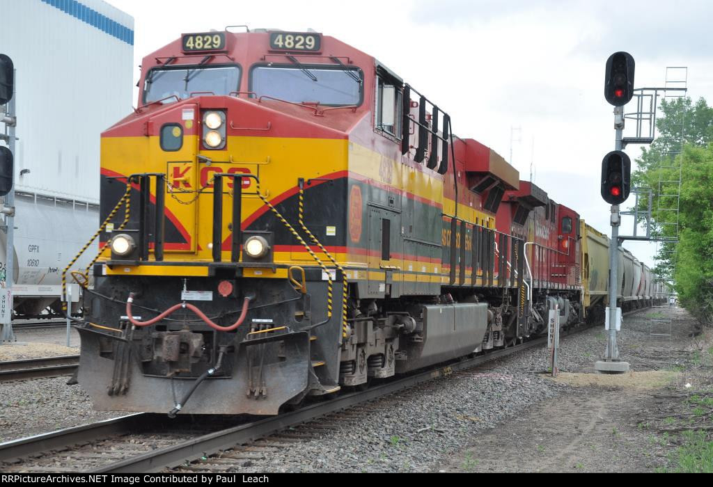 Grain train rolls east